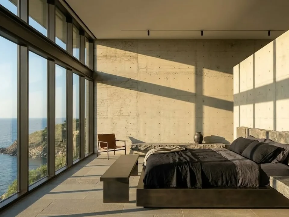 A calm bedroom with a wall of windows